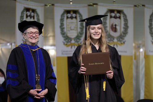 Ashley Hopkins receives two diplomas