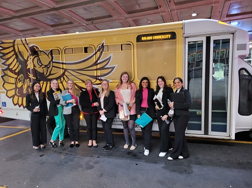 Students in front of the Rowan bus