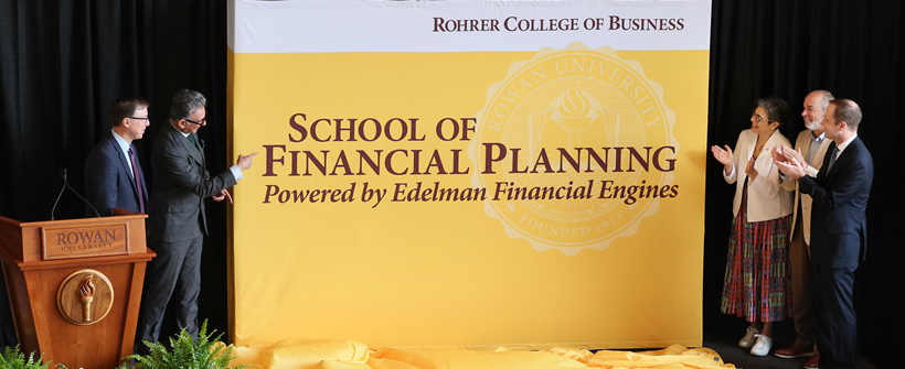 Dean Sarkees, President Houshmand, Jean and Ric Edelman and Ralph Haberli unveil the School of Financial Planning