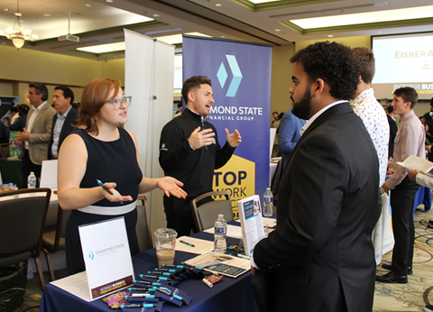 Student talking to a recruiter at the RCB career fair