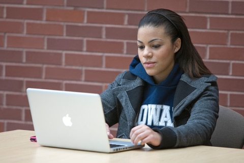 student using laptop